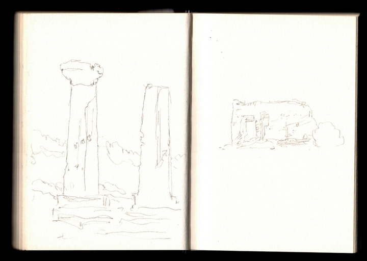 A loose sketch of set of two antique columns with clouds behind them. On the right a single antique building in ruins.